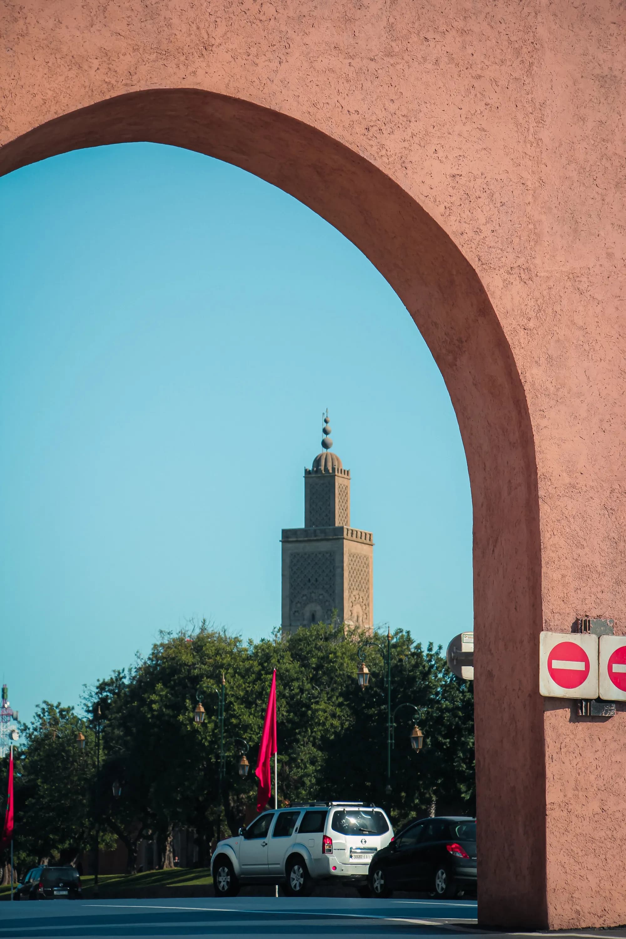 A minaret framed by a stone archway in Rabat, Morocco's capital